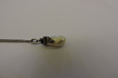 Lot 139 - An early 19th century pearl and diamond snake pendant