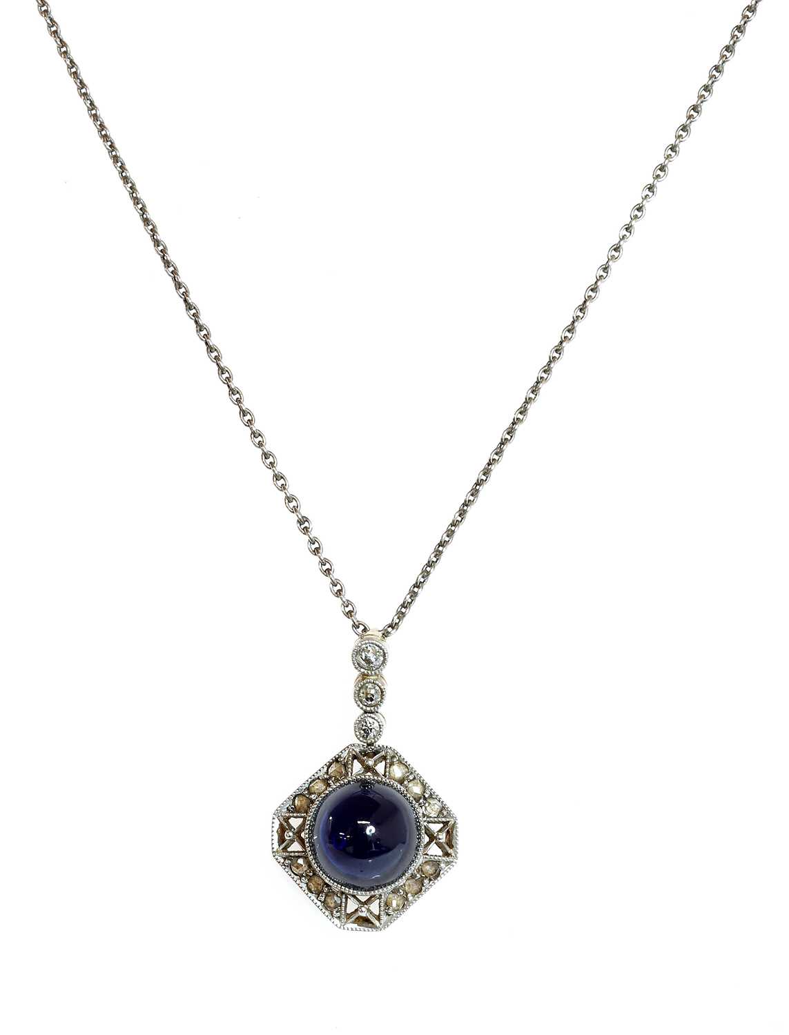 Lot 155 - A Continental Art Deco synthetic sapphire and diamond pendant