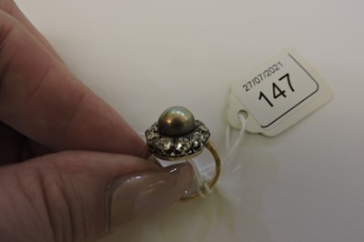 Lot 147 - A Continental natural saltwater pearl and diamond cluster ring, c.1890