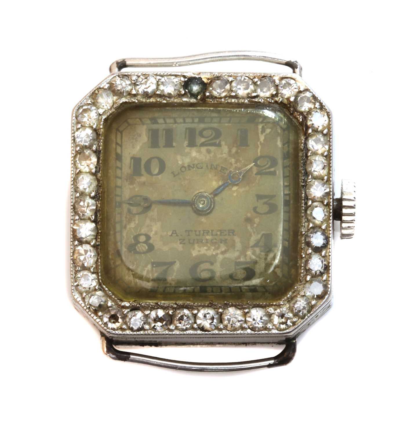 Lot 162 - A ladies' platinum and gold Longines diamond set cocktail watch, c.1925