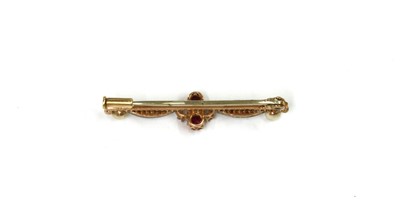 Lot 1042 - A gold and silver, ruby, diamond split pearl bar brooch