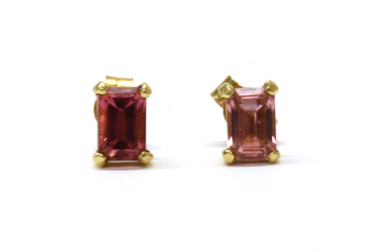 Lot 100 - A pair of 18ct gold single stone tourmaline stud earrings