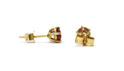 Lot 1220 - A pair of 18ct gold single stone ruby stud earrings