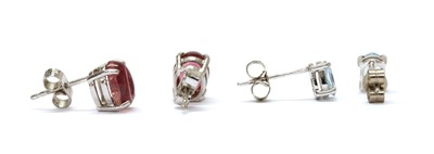 Lot 1392 - A pair of 18ct white gold single stone aquamarine stud earrings