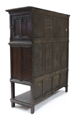 Lot 537 - A Gothic-style oak cupboard
