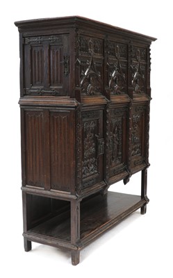 Lot 537 - A Gothic-style oak cupboard