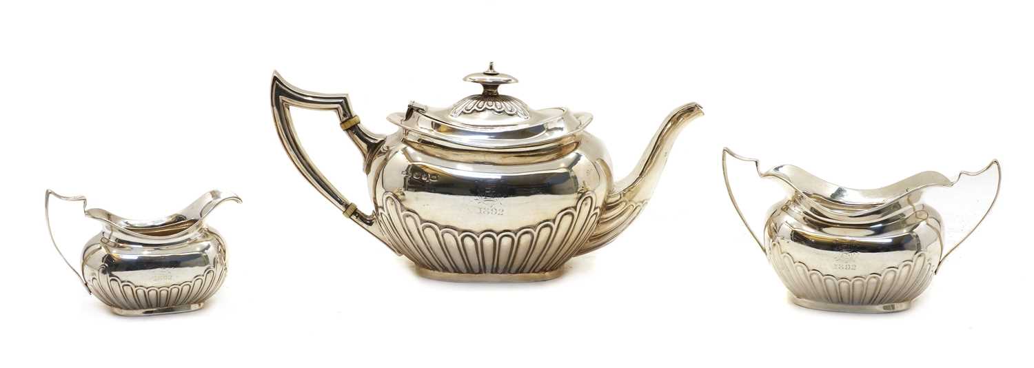 Lot 1 - A Victorian silver three piece tea set