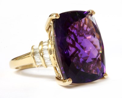 Lot 157 - A gold amethyst and diamond ring