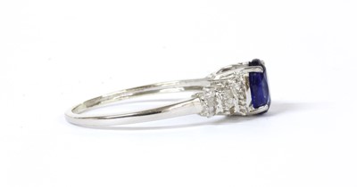 Lot 127 - A white gold sapphire and diamond ring