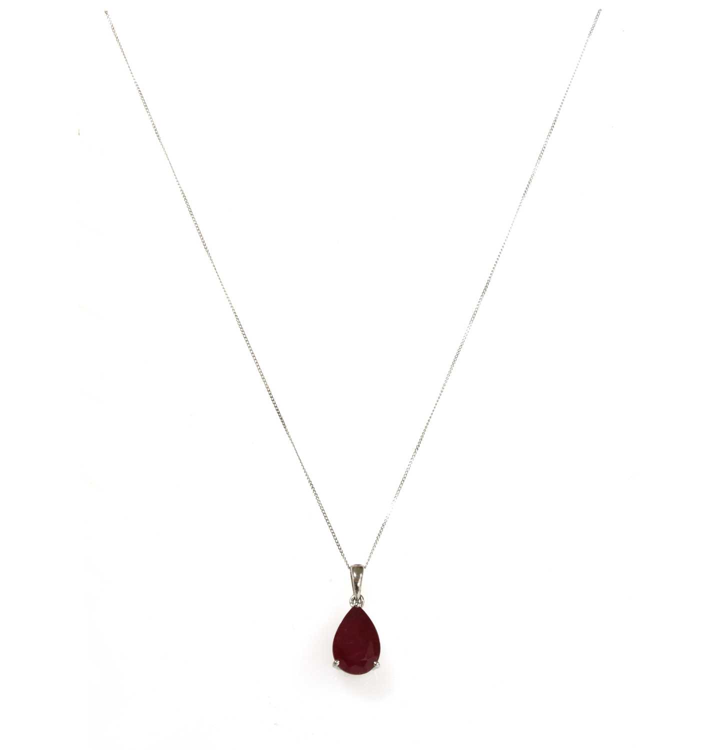 Lot 108 - A white gold single stone fracture filled ruby pendant