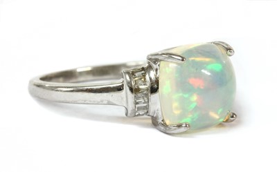 Lot 175 - A white gold opal and diamond ring