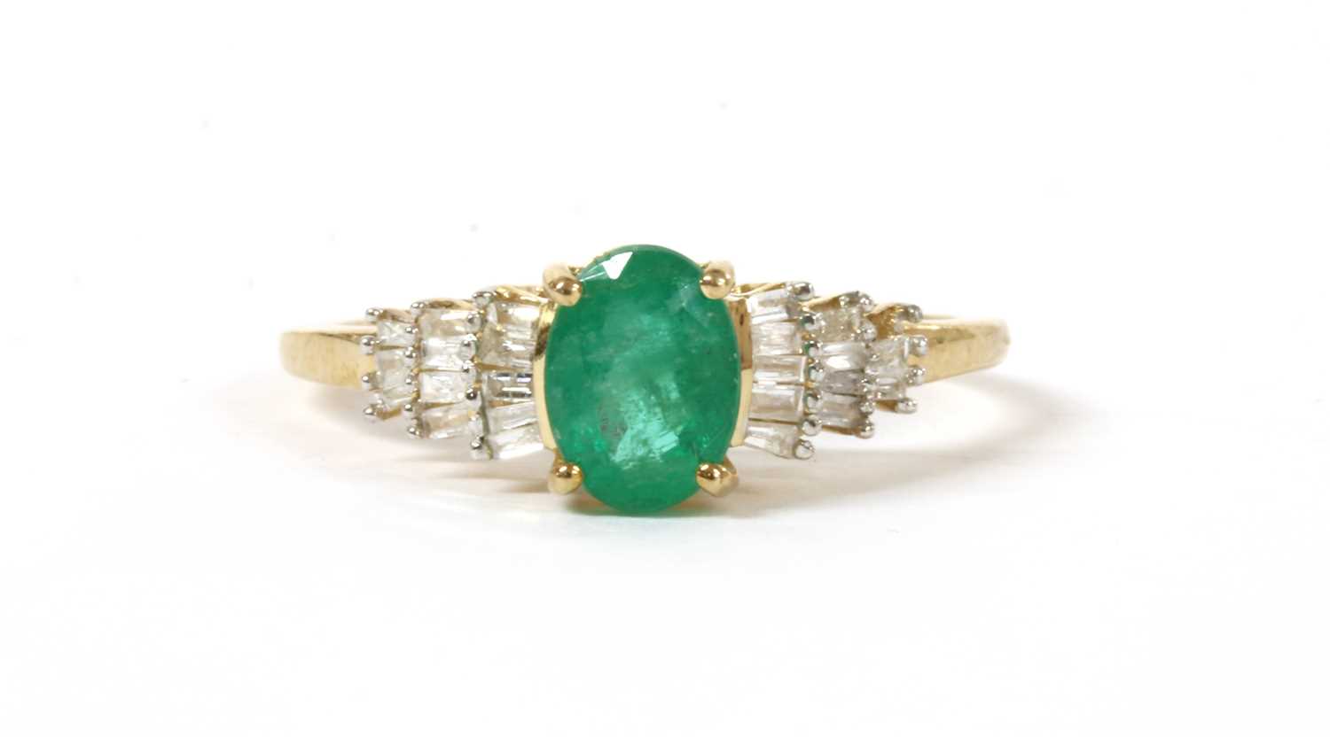 Lot 142 - A gold emerald and diamond ring