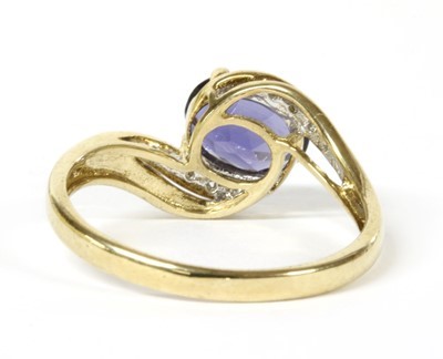 Lot 133 - A 9ct gold iolite and diamond ring