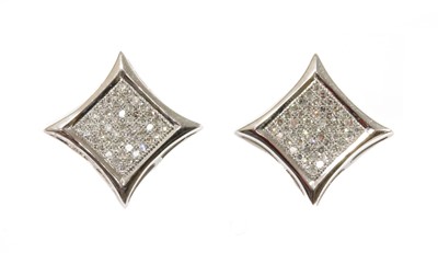 Lot 79 - A pair of 9ct white gold diamond star stud earrings