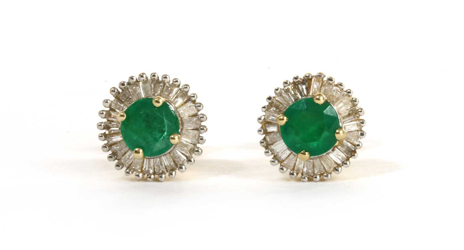 Lot 141 - A pair of gold emerald and diamond cluster stud earrings