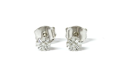 Lot 78 - A pair of white gold diamond cluster stud earrings