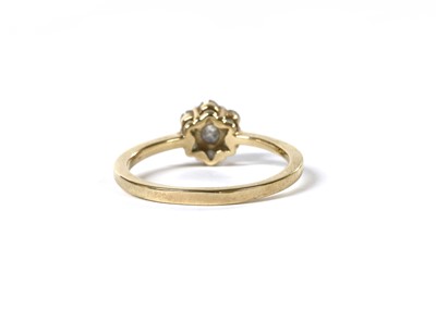 Lot 56 - A gold diamond daisy cluster ring