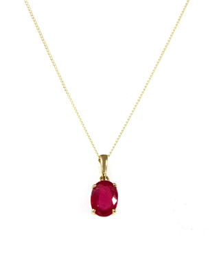 Lot 107 - A gold single stone fracture filled ruby pendant