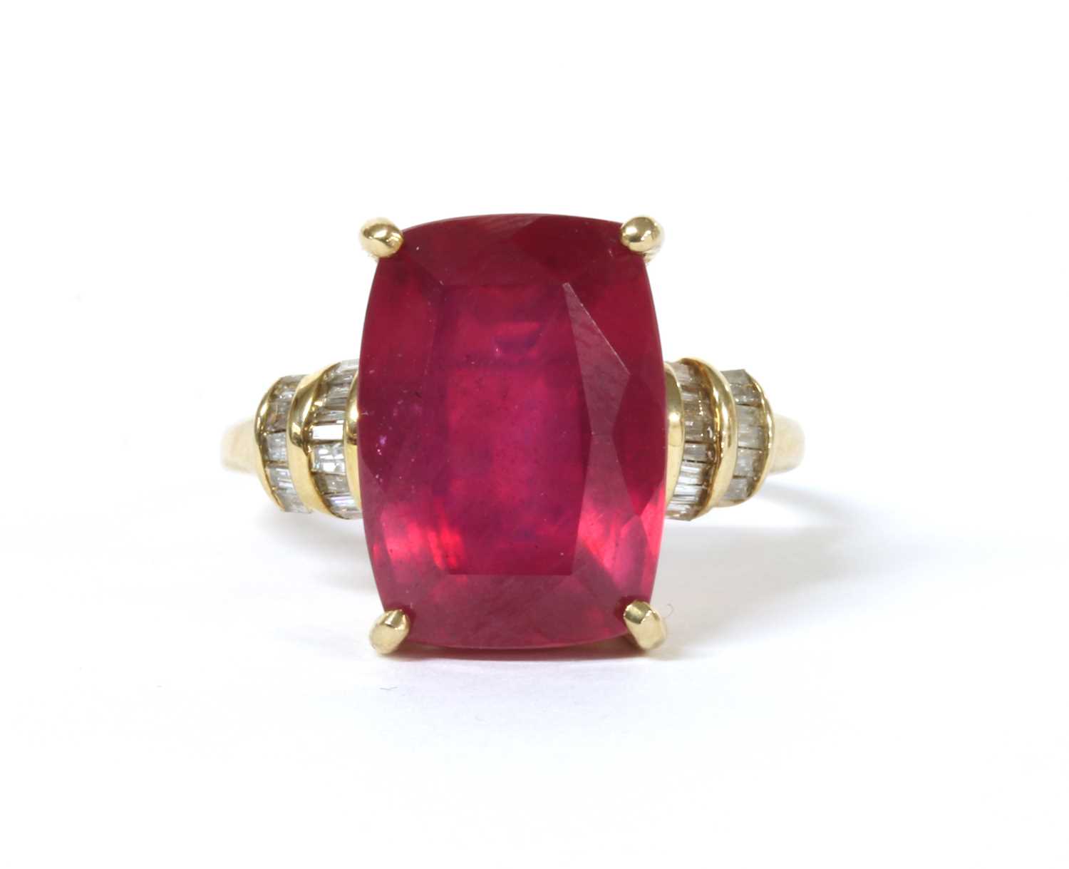 Lot 110 - A gold fracture filled ruby and diamond ring