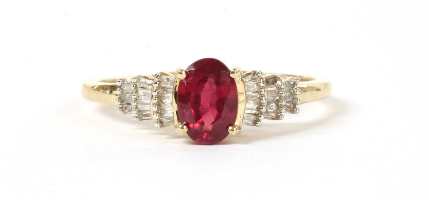 Lot 111 - A gold fracture filled ruby and diamond ring