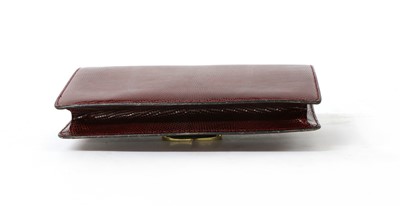 Lot 268 - A vintage Gucci red lizard skin clutch bag