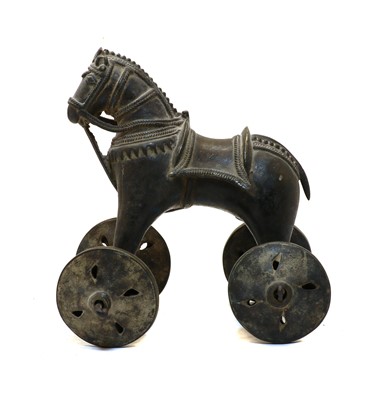 Lot 105 - An early 20th century Indian brass wheeled model horse