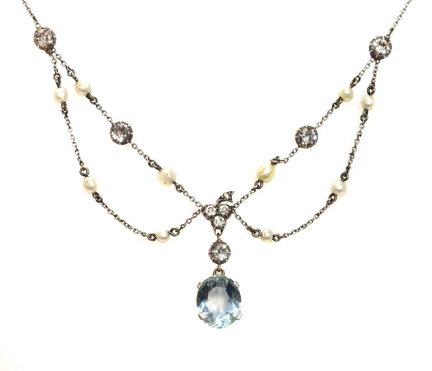 Lot 110 - An Edwardian aquamarine, diamond and pearl swag necklace, c.1910