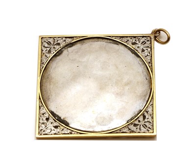 Lot 35 - A gold and silver, ivory and diamond cameo pendant