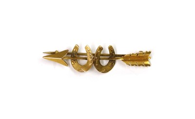 Lot 1018 - A late Victorian gold arrow and horseshoe brooch
