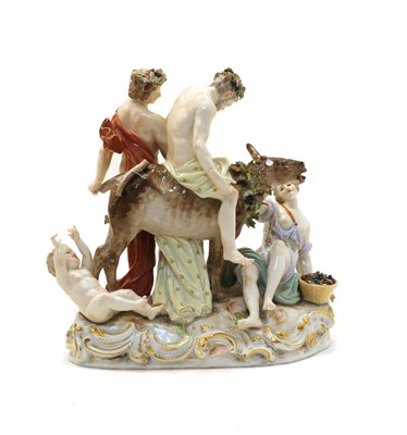 Lot 124 - A Meissen porcelain figural group of the drunken Silenus