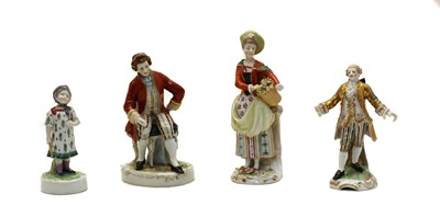 Lot 284 - A collection of four Continental ceramic figures