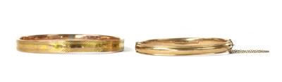 Lot 1368 - A 9ct gold hollow bangle