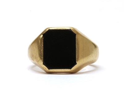 Lot 1486 - A 9ct gold onyx signet ring, by Henry Griffith & Sons Ltd.