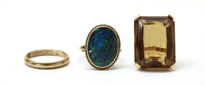 Lot 1383 - A gold single stone smoky quartz ring