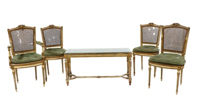 Lot 202 - A set of four Louis XVI style painted elbow and giltwood chairs