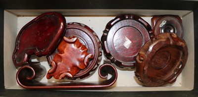 Lot 117 - A collection of Chinese wood stands