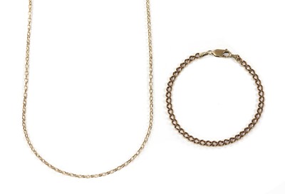 Lot 1376 - A gold curb link bracelet