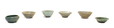 Lot 158 - Six Chinese Song period (?) celadon glazed bowls