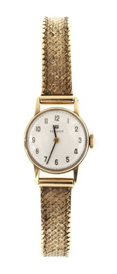 Lot 1523 - A ladies' 9ct gold Tissot mechanical bracelet watch