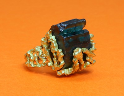 Lot 243 - A gold single stone tourmaline ring, c.1970