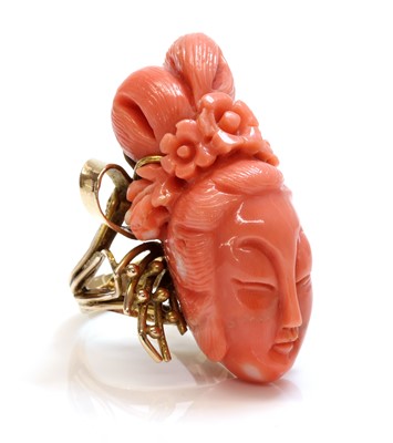 Lot 237 - An Asian carved coral ring