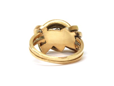 Lot 1080 - A gold knot design ring
