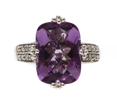 Lot 1253 - A white gold amethyst and diamond ring