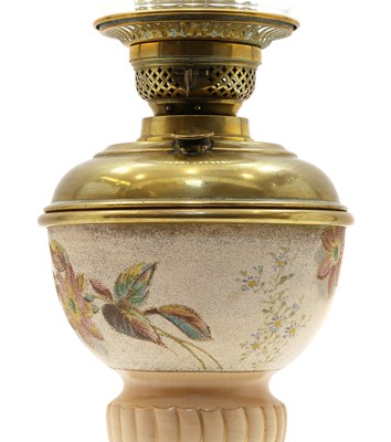 Lot 265 - A continental glazed stoneware oil lamp