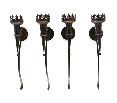 Lot 305 - A set of four wrought iron wall sconces of ecclesiastical inspiration
