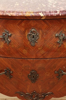 Lot 187 - A French Louis XV-style serpentine commode