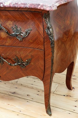 Lot 187 - A French Louis XV-style serpentine commode