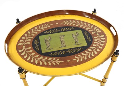 Lot 56 - A pair of Regency-style yellow-painted toleware side tables