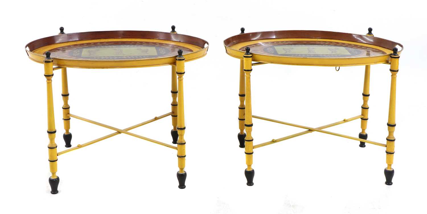 Lot 56 - A pair of Regency-style yellow-painted toleware side tables