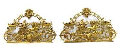 Lot 187 - A pair of 19th century cast brass mounts